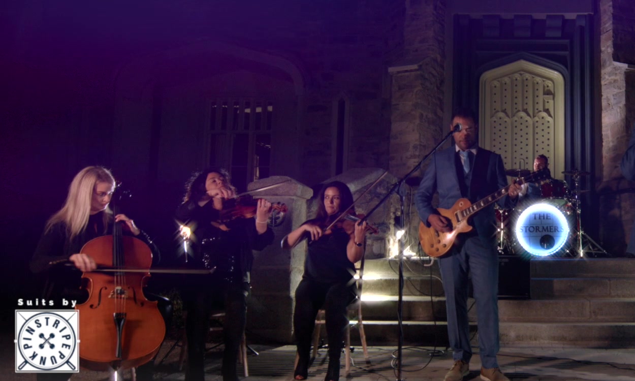Guitarist performing live with The Stormers